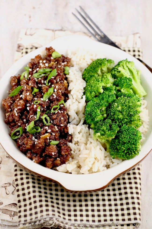 Easy Korean Ground Beef and Broccoli served over rice with sesame seeds and green onions