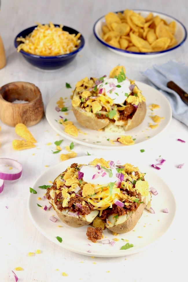 Chili Baked Potato topped with sour cream, cheese, red onion and Fritos