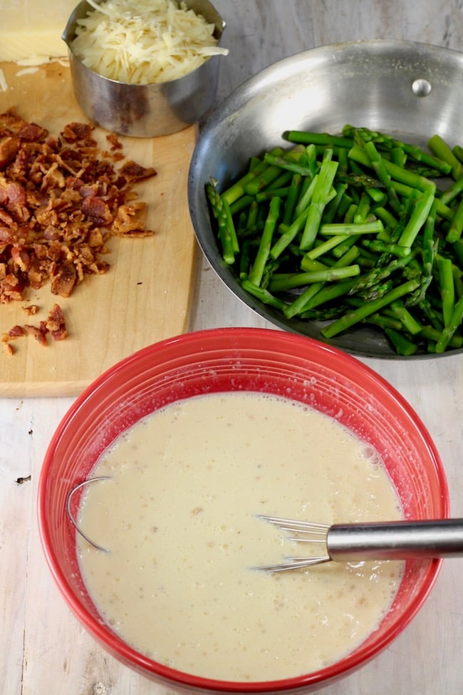 How to Make Quiche ~ eggs and cream, asparagus, cooked and crumbled bacon and Gruyere cheese