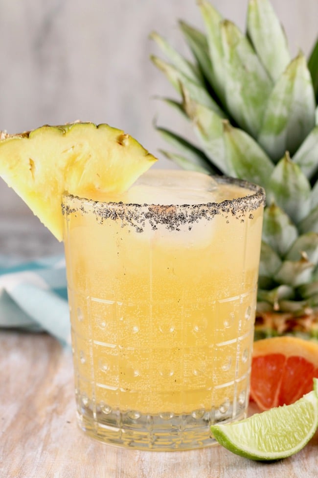 Pineapple Paloma Cocktail garnished with fresh pineapple and made with tequila and grapefruit juice