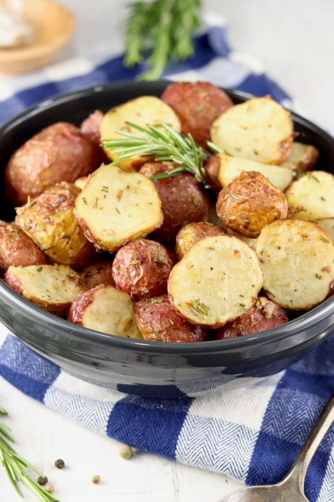 Air Fryer Roasted Potatoes garnished with fresh rosemary