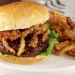 BBQ Burgers - homemade barbecue sauce, topped with crispy onion strings