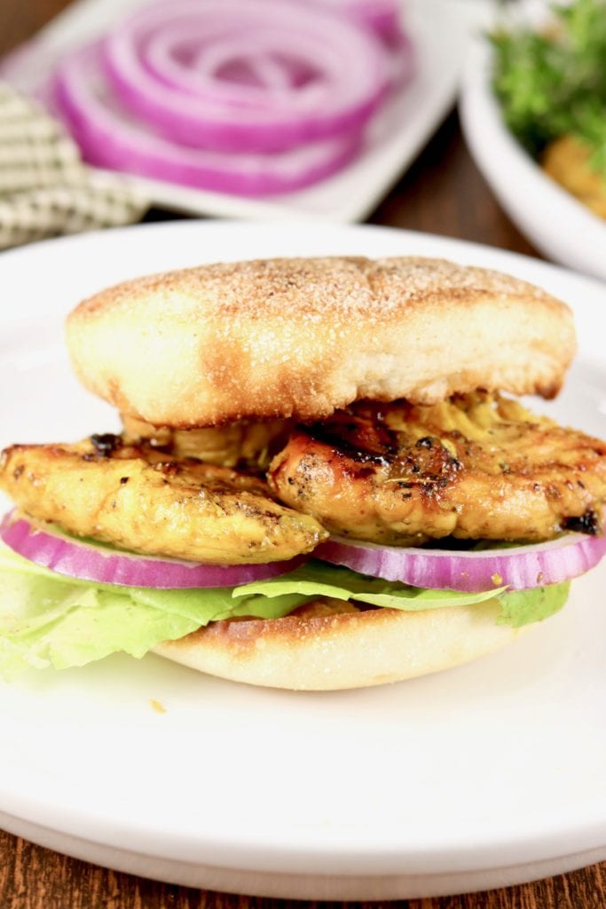 BBQ Mustard Chicken Tender Sandwiches on English Muffins with lettuce and red onion