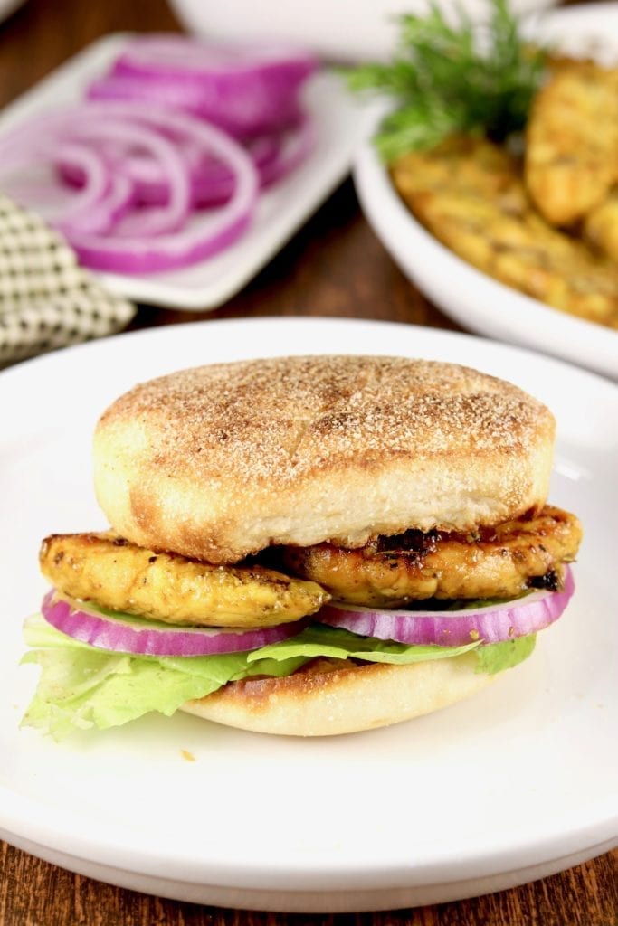 BBQ Chicken Tender Sandwich on English Muffin with red onion and lettuce