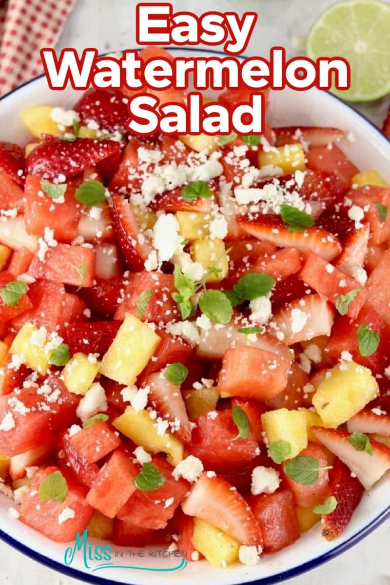 Bowl of watermelon salad with text overlay.