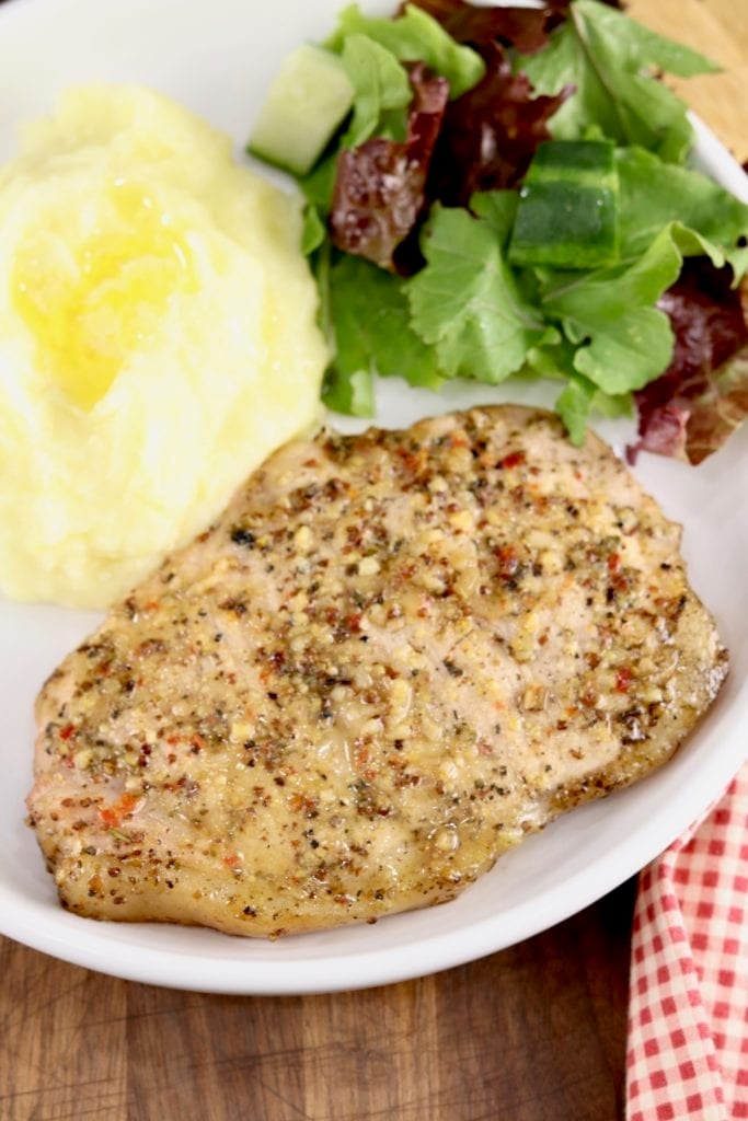 Italian Pork Chops with mashed potatoes and salad