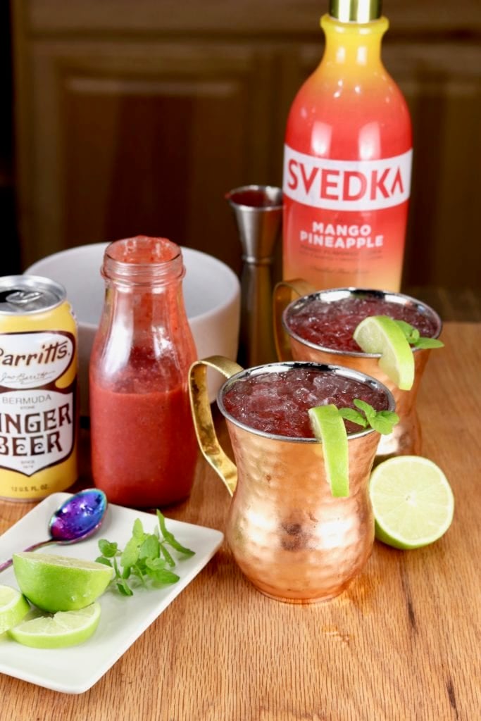 Moscow Mule Cocktail with Svedka Vodka, Ginger Beer, Strawberry Puree in a jar