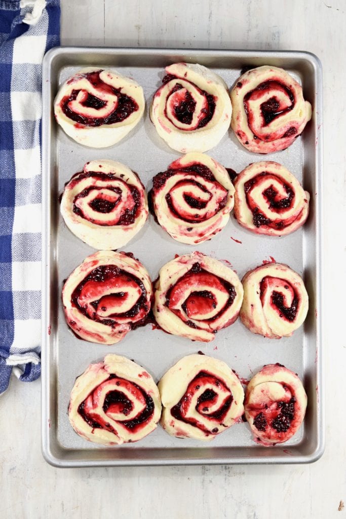 Jelly Roll Pan of sliced sweet rolls with blackberry filling