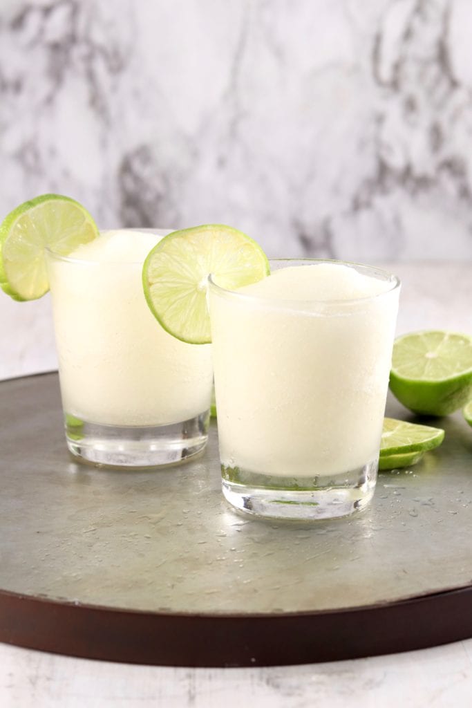 Frozen cocktail with fresh lime garnish