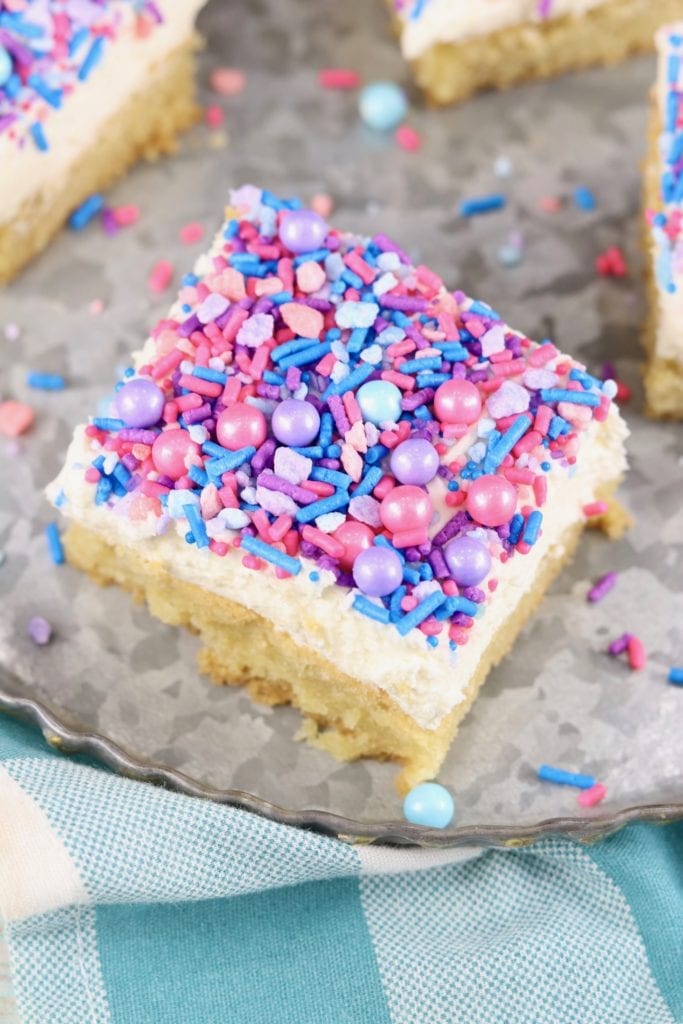 Overhead shot of cookie bars with pastel sprinkles
