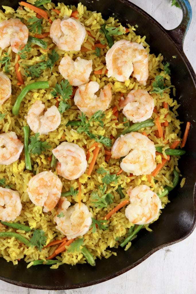Skillet of Fried Rice with carrots, green beans and shrimp
