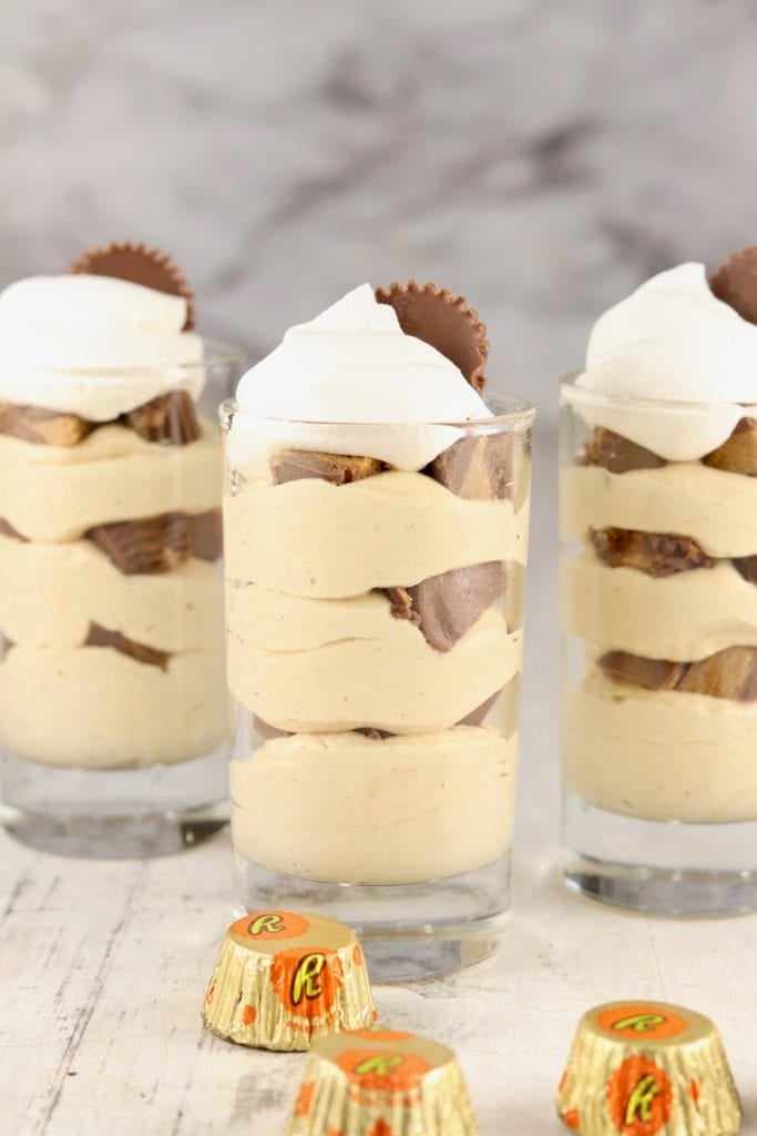 No bake peanut butter dessert in glasses with peanut butter cups