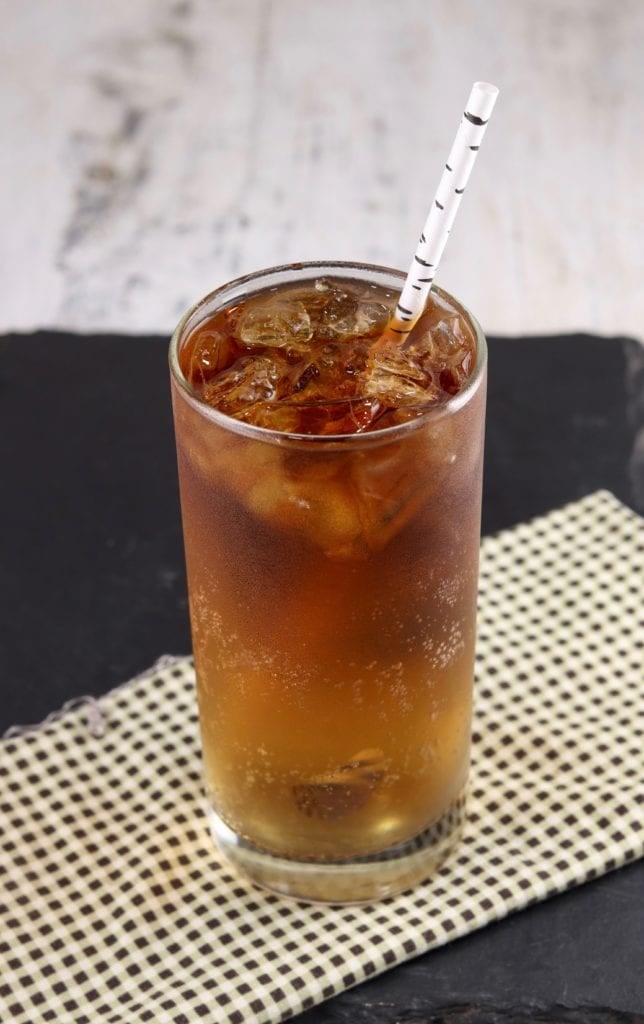 Rum and Ginger Cocktail with straw