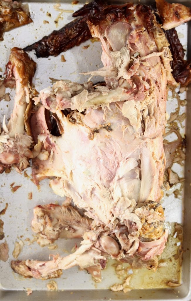 Turkey carcass on a sheet pan for making stock