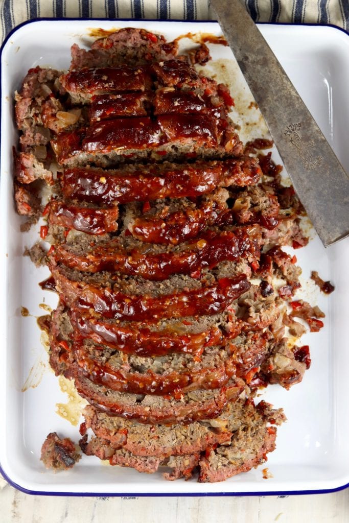 Sliced bbq meatloaf on a platter