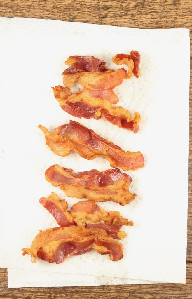 Bacon strips on a paper towel