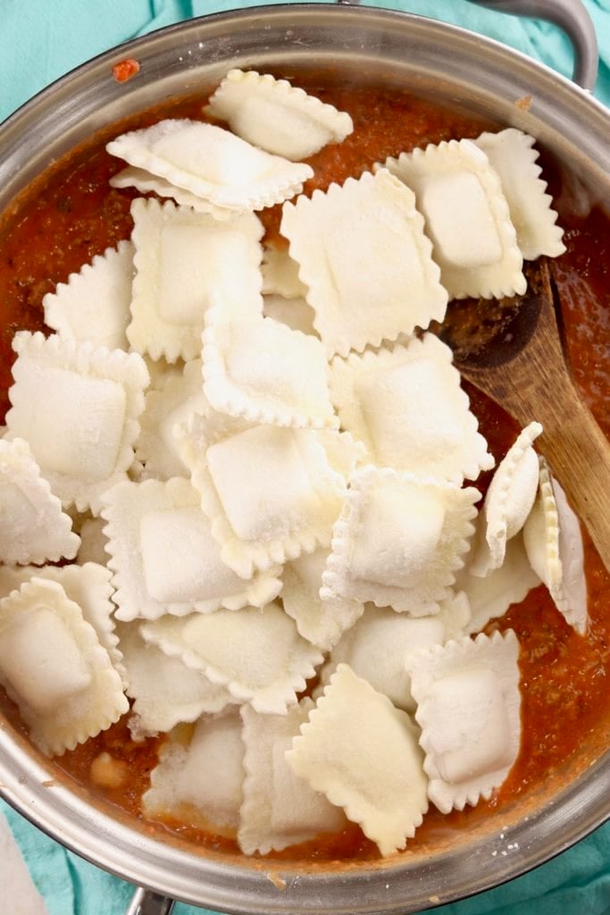 Cheese Ravioli in skillet with tomato sauce