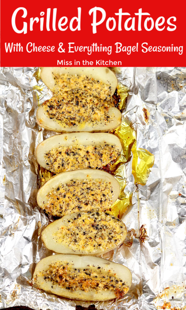 Foil packet with potato halves stuffed with cheese