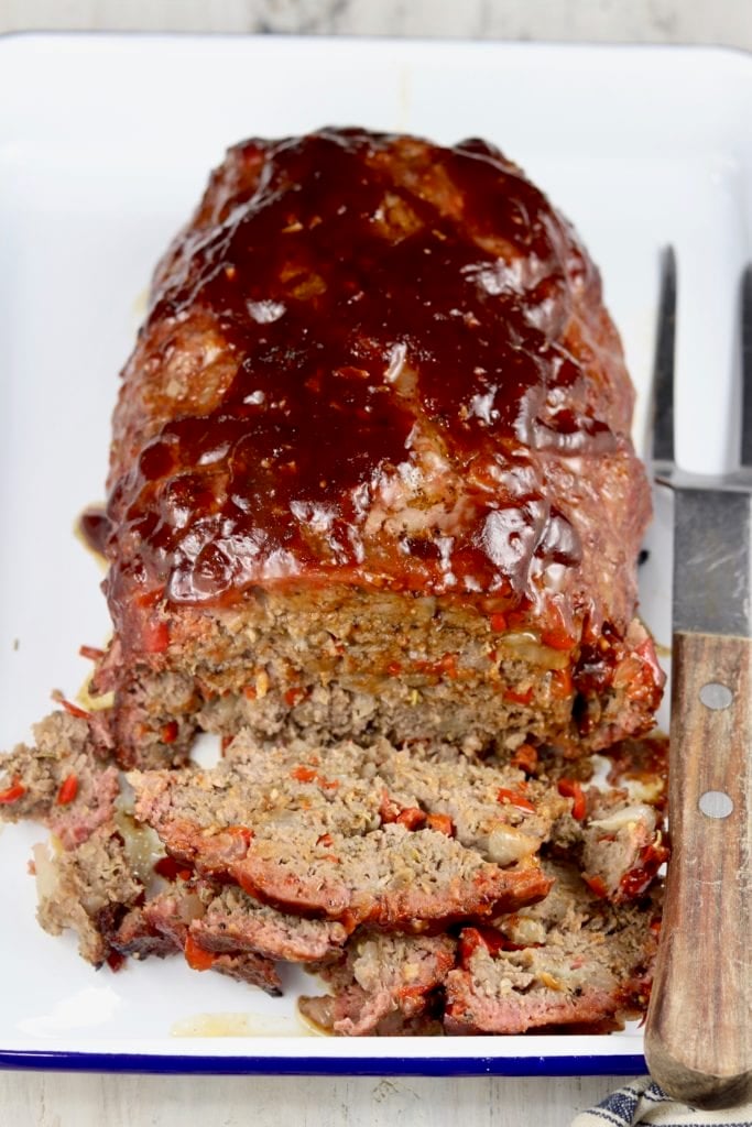 Meatloaf on a tray with 3 slices