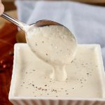 Homemade Horseradish Sauce dipped with a spoon