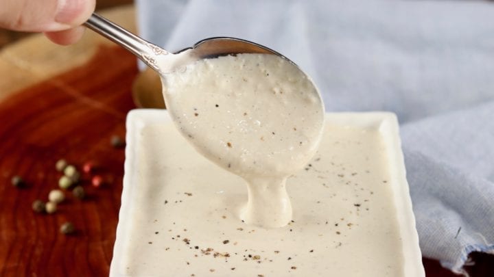 Homemade Horseradish Sauce dipped with a spoon