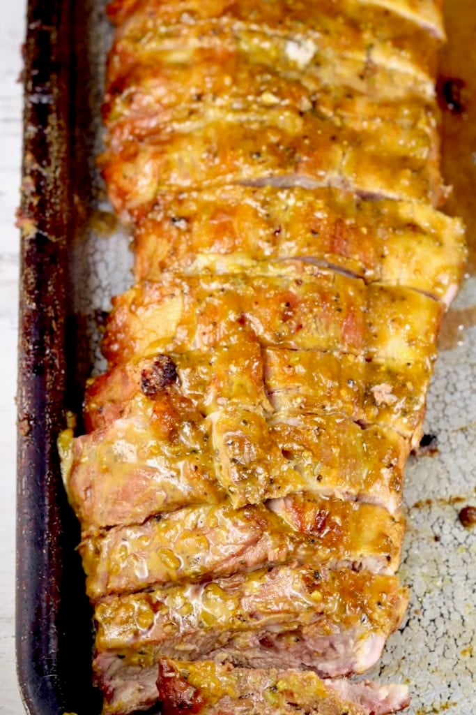Mustard BBQ Ribs grilled and on a sheet pan for serving