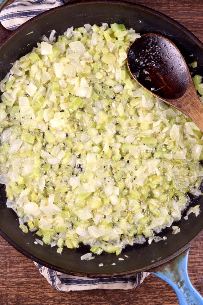 Skillet with cooked onion, celery and garlic
