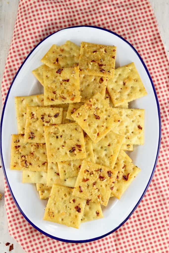 platter of crackers with red pepper flakes