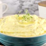 Creamy Mashed Potatoes in a blue bowl