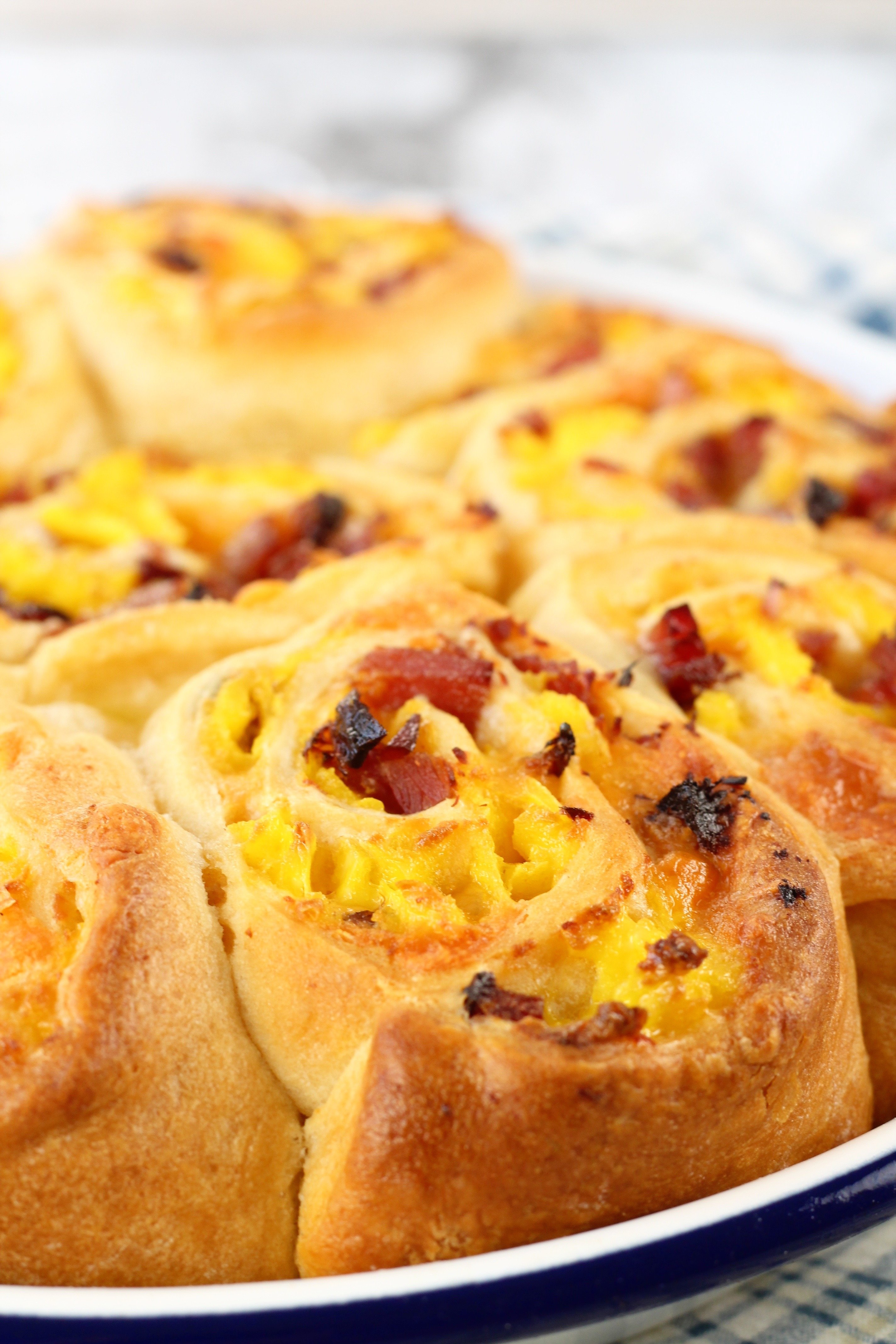 Ham and Egg Breakfast Rolls in a white pie pan