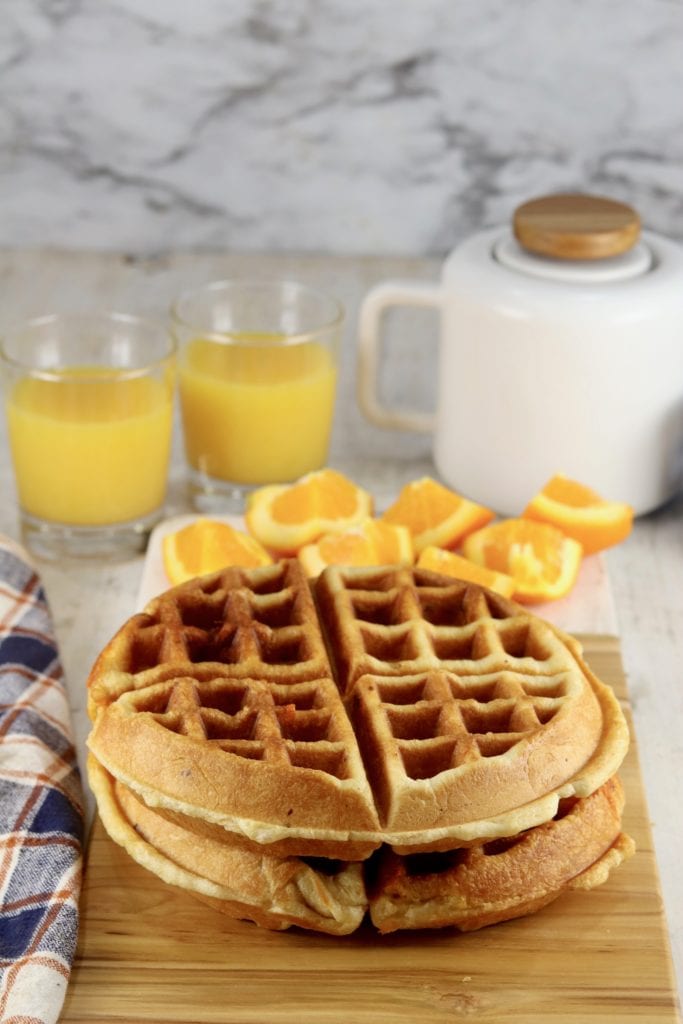 Stuffed Waffles on a serving board with oranges