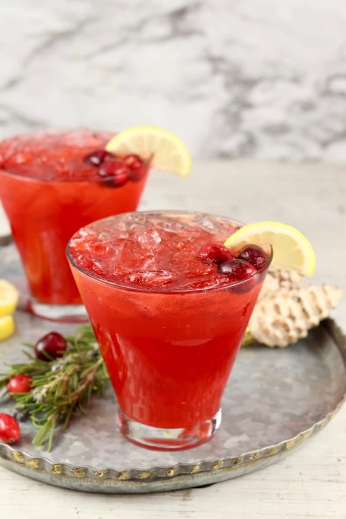 Cranberry Vodka Cocktail with lemon and cranberry garnish