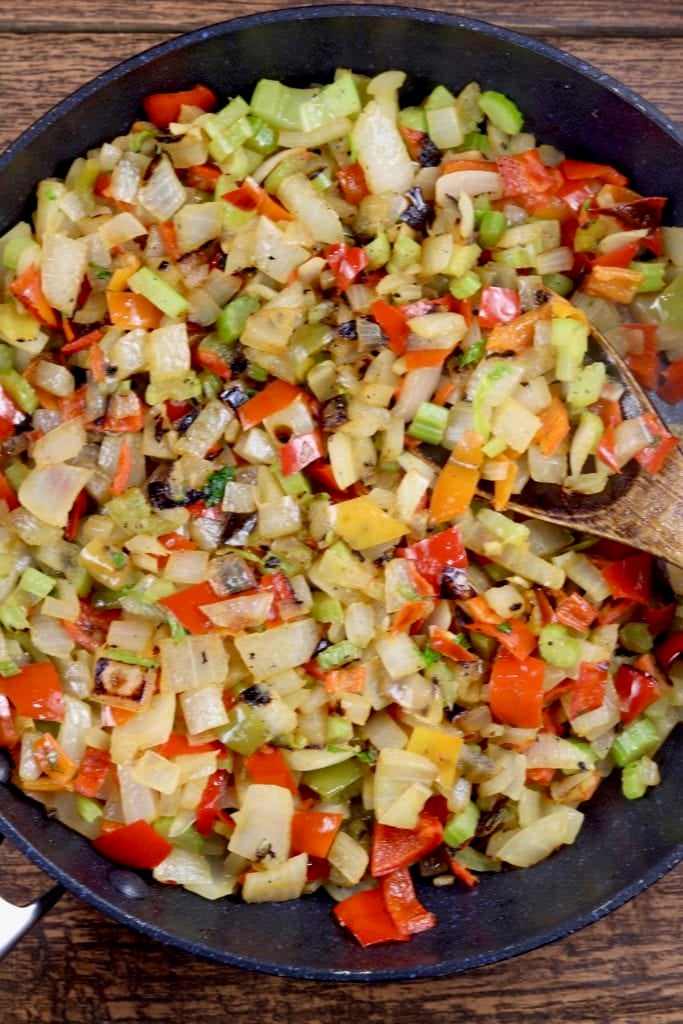 Cooked vegetables in a skillet for red beans and riced