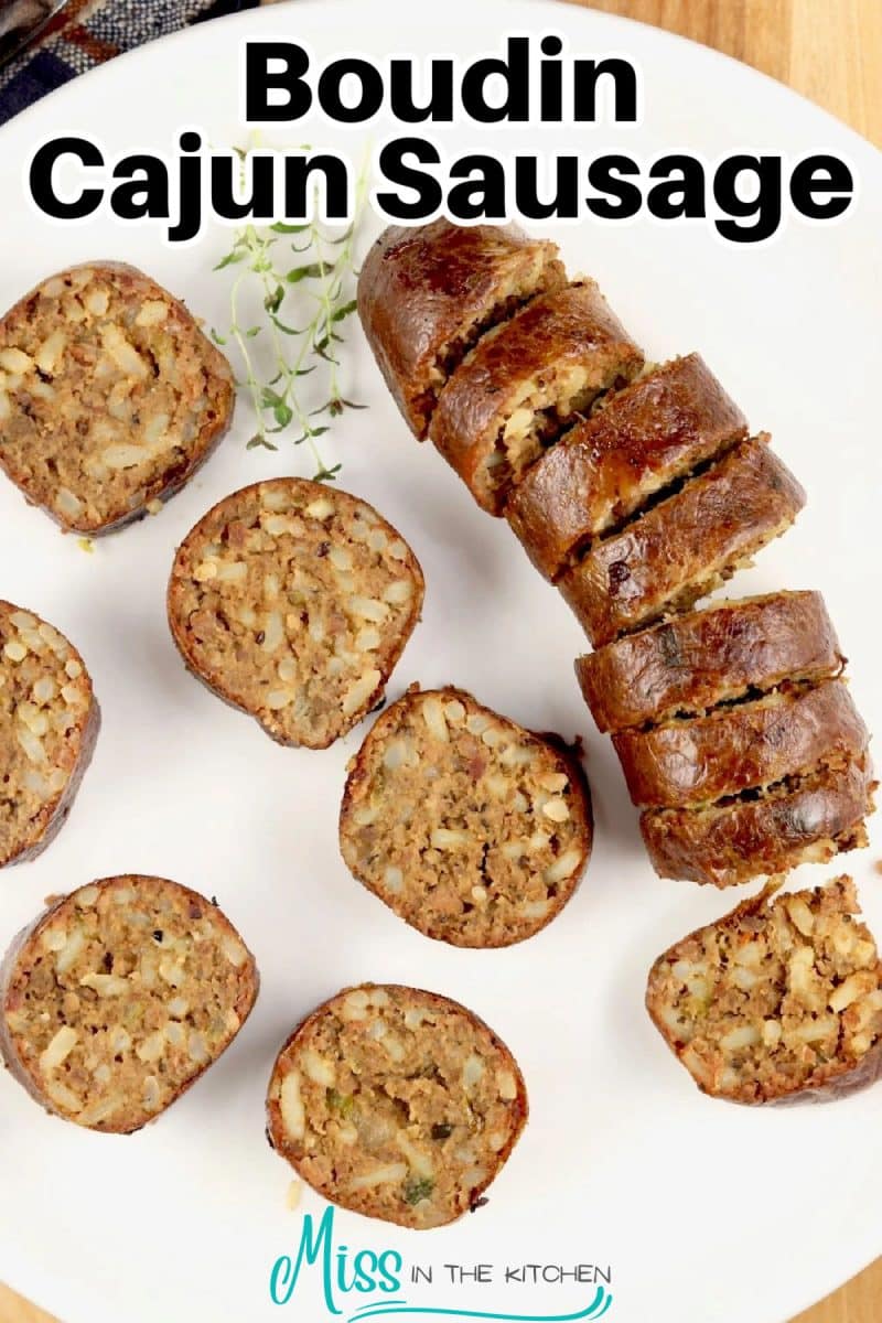 Boudin Sausage slices on a plate - text overlay.