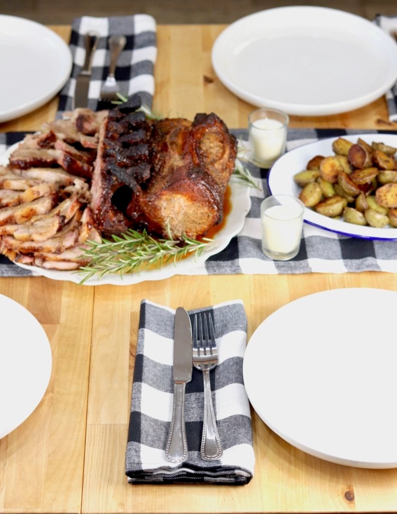Dinner table with roast pork 