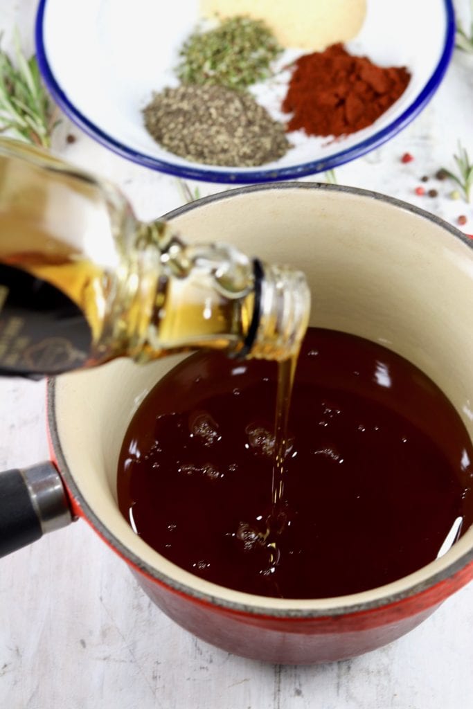 Maple syrup in a sauce pan for glaze