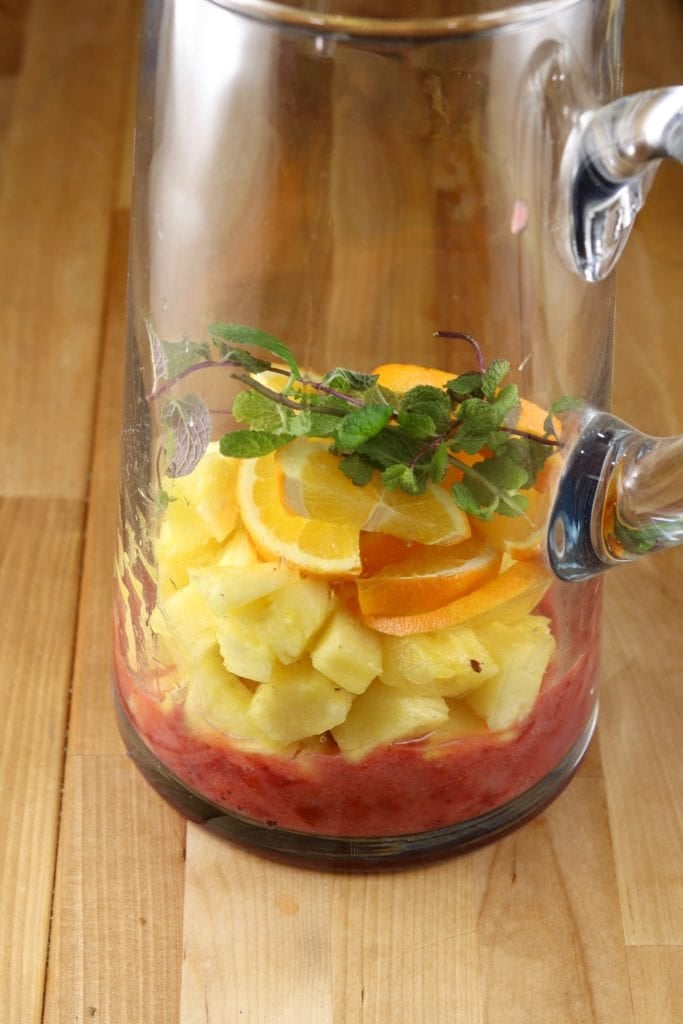 Fresh fruit in a pitcher for punch