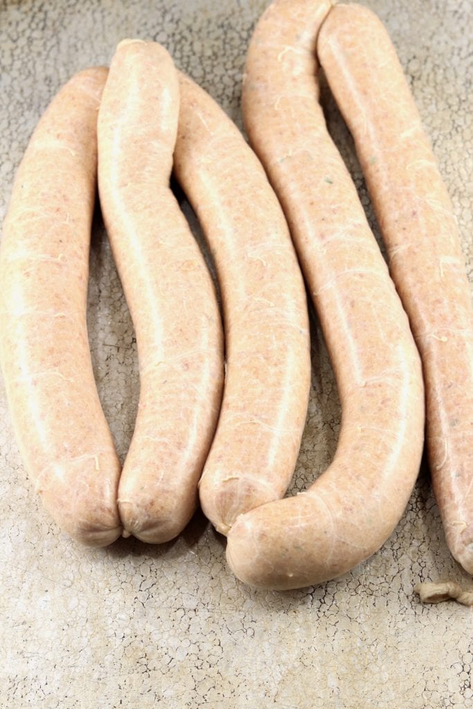 How to prepare sausage links for smoking or grilling Andouille Sausage links on a sheet pan before smoking