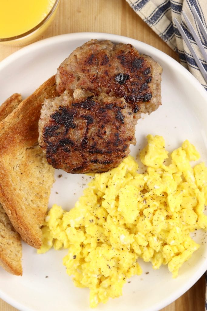Breakfast sausage, scrambled eggs and toast