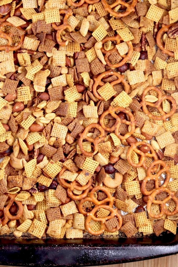 sheet pan of snack mix with nuts and cereal
