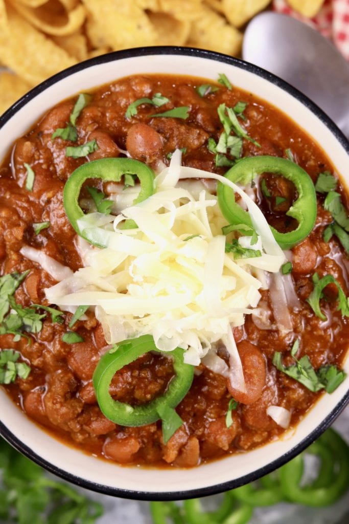 Chili topped with cheese and jalapenos