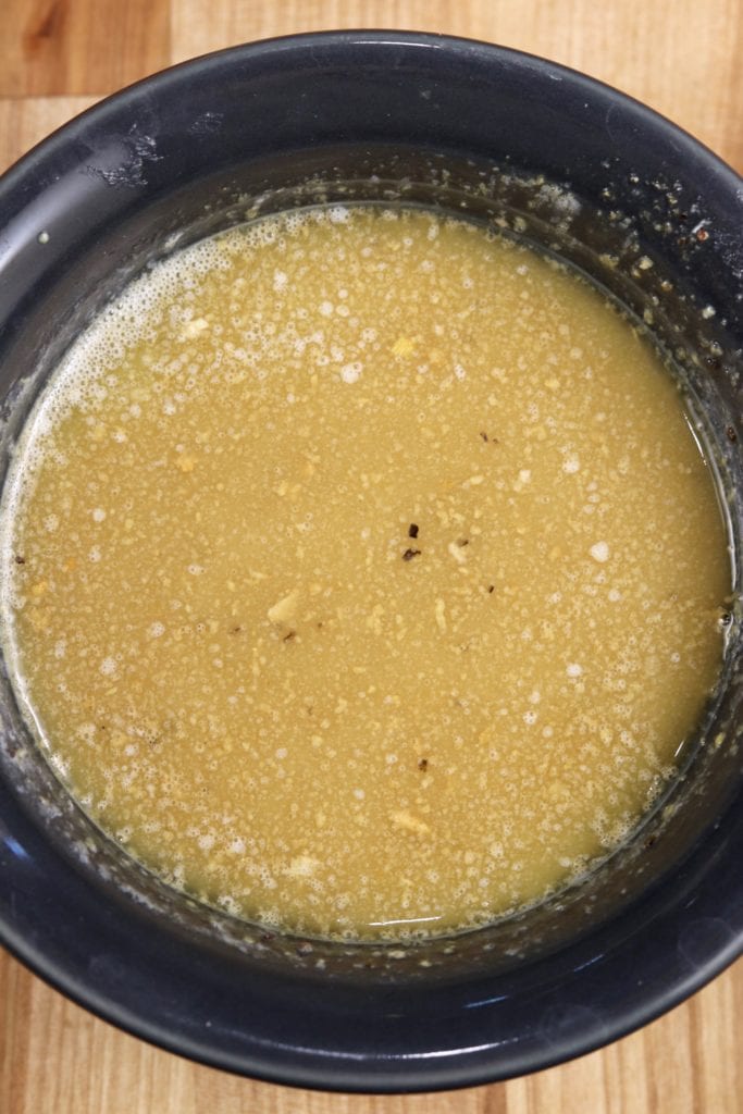 melted butter and seasonings for baked sliders