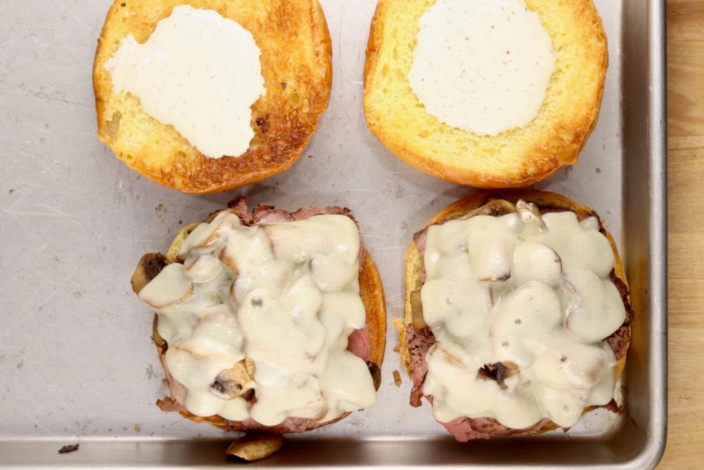 White barbecue sauce on roast beef sandwich
