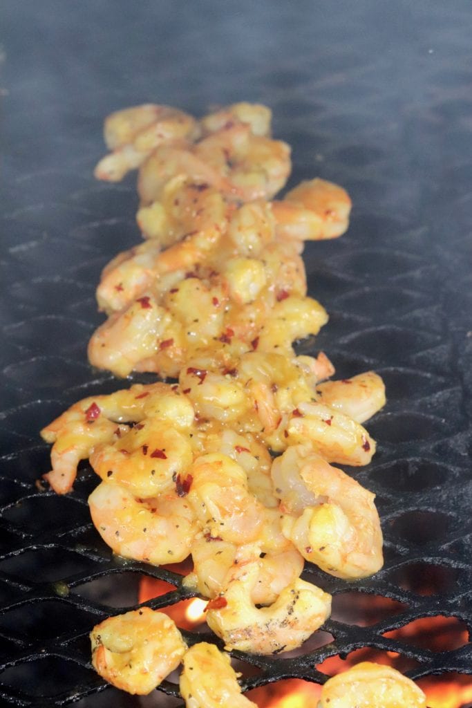 Grilled Honey Mustard Shrimp on the grill over a wood fire