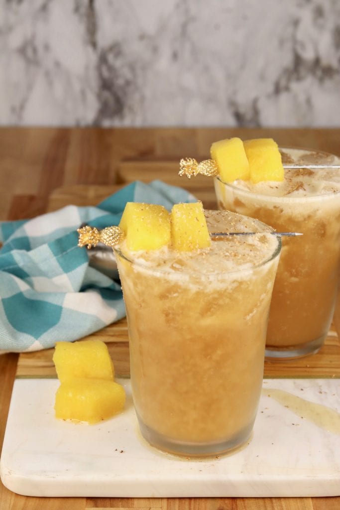 Pineapple and Dark Rum Cocktail with pineapple garnish