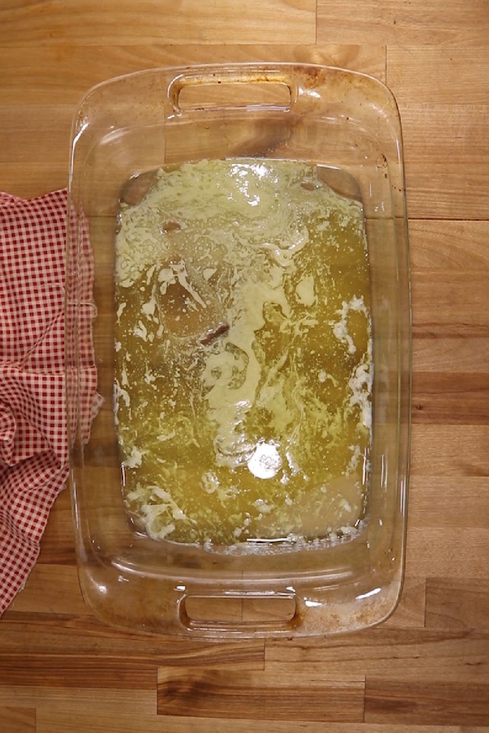 baking dish with melted butter