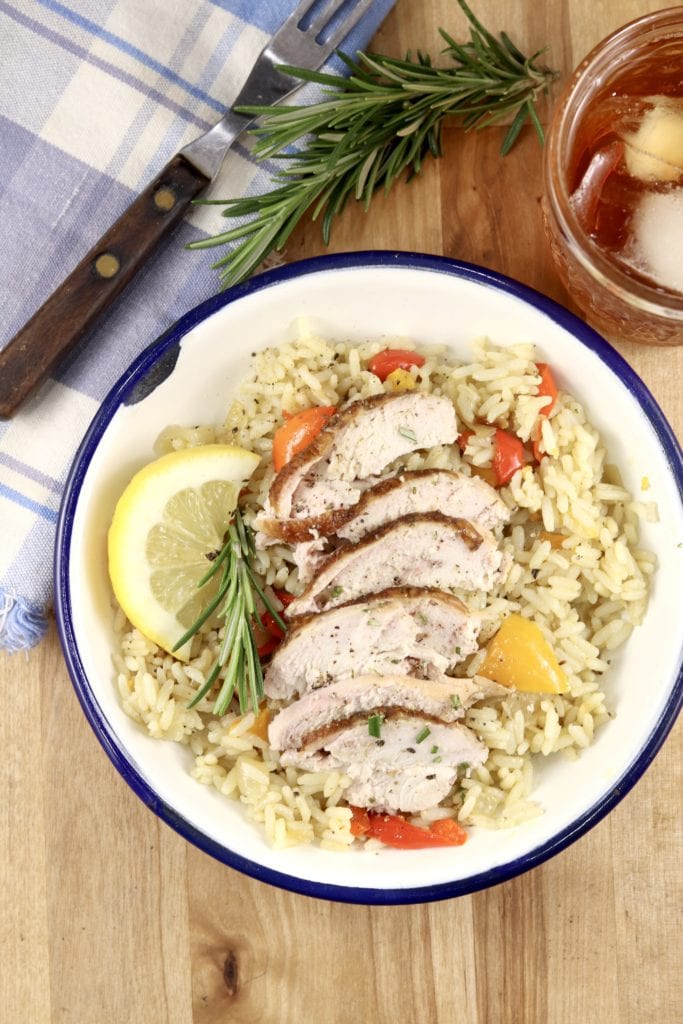 Sliced smoked chicken with rice pilaf