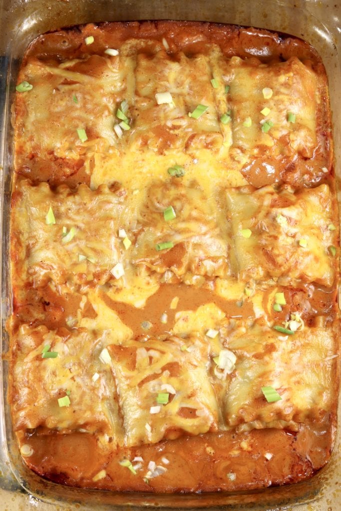 Pan of chicken enchilada lasagna roll ups