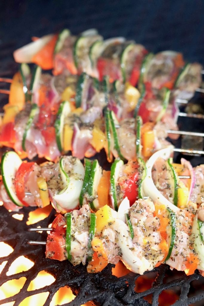 Grilled Chicken Kebabs with vegetables on a grill