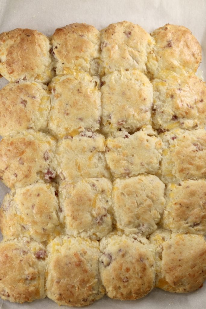 Baked pan of buttermilk biscuits with ham and cheese